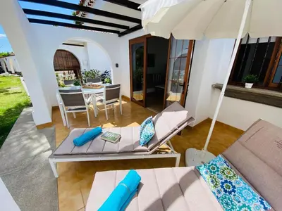 Zona de estar de Bungalow Parque Golf by SunHousesCanarias