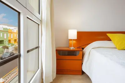 Cama o camas de una habitación en DUPLEX EN EL CENTRO DE GALDAR