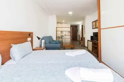 Cama o camas de una habitación en LA CICER BEACH APARTMENT ll