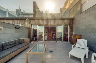 Zona de estar de Incredible terrace ocean views By CanariasGetaway