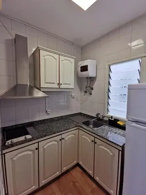 Una cocina o zona de cocina en BEACH ACOGEDOR ESTUDIO, Las Canteras