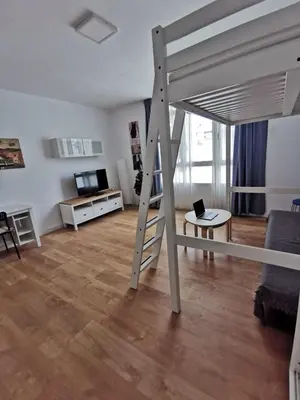 Una televisión o centro de entretenimiento en BEACH ACOGEDOR ESTUDIO, Las Canteras
