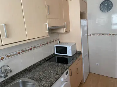 Una cocina o zona de cocina en Piso de 2 habitaciones a 200 metros de la playa