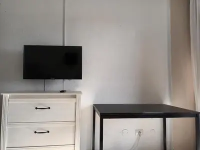 Una televisión o centro de entretenimiento en DAC HOME AGAETE PARQUE