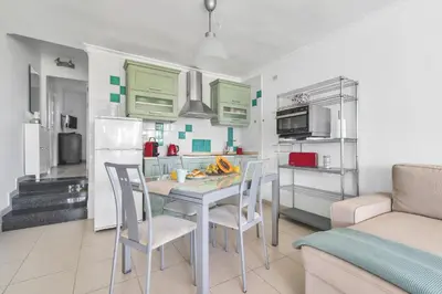 Una cocina o zona de cocina en Home2Book The Place to Be, Pool&Beach San Agustin