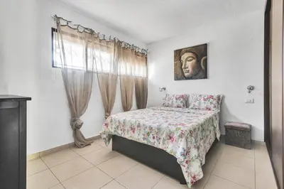 Cama o camas de una habitación en Home2Book The Place to Be, Pool&Beach San Agustin