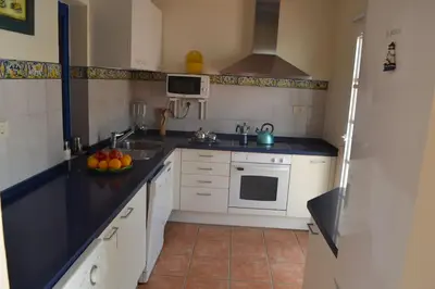 Una cocina o zona de cocina en FABULOUS BUNGALOW , WIFI, SWIMMING POOL AND BEACH