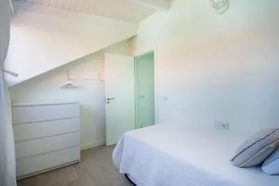 Cama o camas de una habitación en FABULOUS BUNGALOW , WIFI, SWIMMING POOL AND BEACH