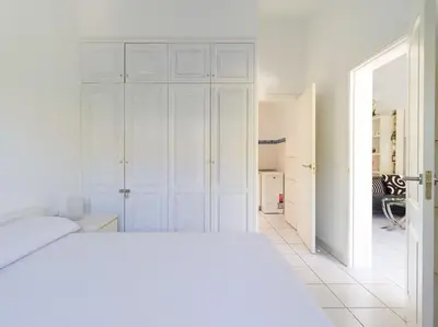 Cama o camas de una habitación en Orinoco Suites Puerto Rico