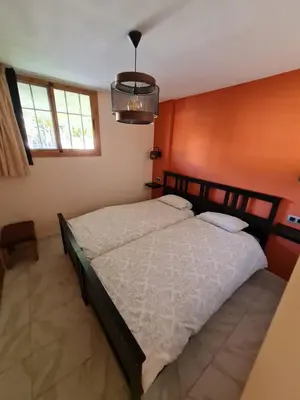 Cama o camas de una habitación en Cozy apartment very close to Yumbo Center