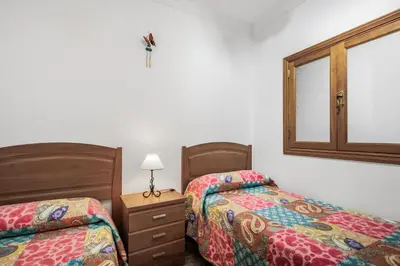 Cama o camas de una habitación en Solarium Agaete Valley Retreat 3-BR