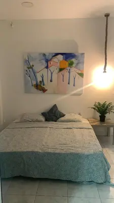 Cama o camas de una habitación en KYO Surf Hostel