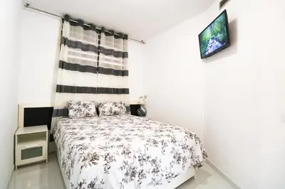 Cama o camas de una habitación en Cura Marina Seafront Playa del Cura