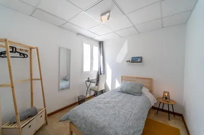Cama o camas de una habitación en Un Lugar House Canteras - Coliving