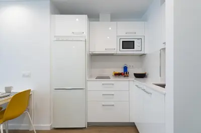 Una cocina o zona de cocina en HomeForGuest Moderno Estudio junto a Las Canteras