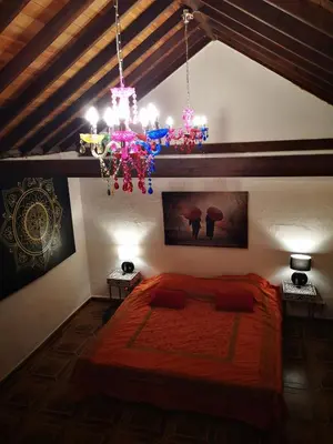 Cama o camas de una habitación en Suite Zen y Cueva Refugio