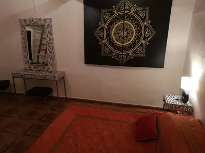 Cama o camas de una habitación en Suite Zen y Cueva Refugio