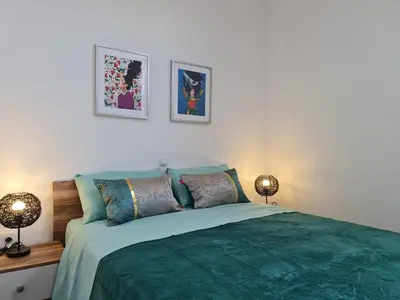 Cama o camas de una habitación en Yumboflat Two Bedroom Apartment