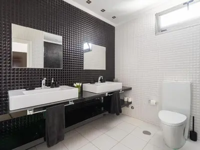 Un baño de Entire Home Meloneras BBQ, PoolGolf