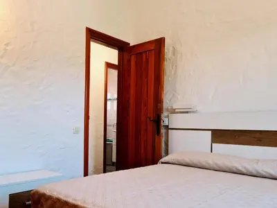 Cama o camas de una habitación en Las Tartanas Two Bedroom Bungalow