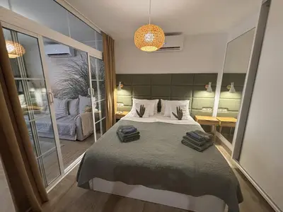 Cama o camas de una habitación en Cactus Sombrerudo- bright apartment next to Yumbo