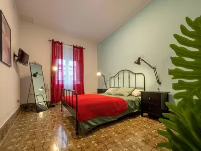 Cama o camas de una habitación en El Rincón de los Artistas