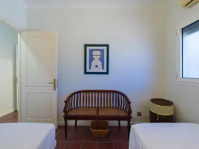 Cama o camas de una habitación en FaroVela Suites Pasito Blanco