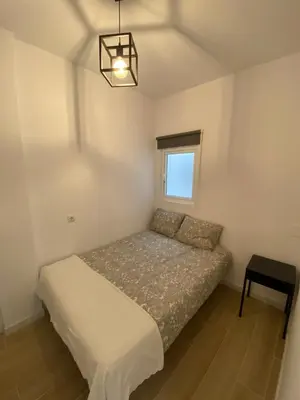 Cama o camas de una habitación en Beach balcony lounge