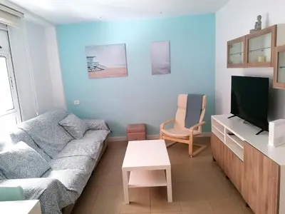 Una televisión o centro de entretenimiento en CANTERAS NICE BEACH. Holiday Home.2Bdrm.