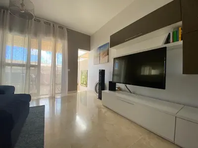 Una televisión o centro de entretenimiento en Casa de Balance