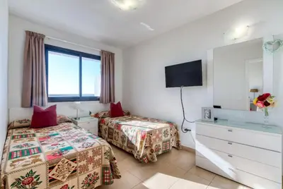 Cama o camas de una habitación en Apartamentos Liszt