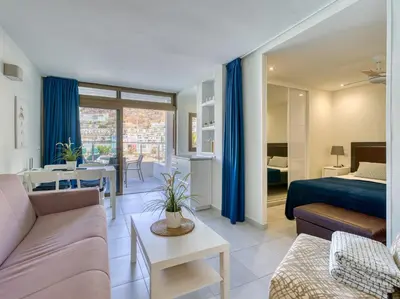 Cama o camas de una habitación en Sol Suites Puerto Rico