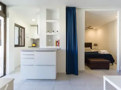 Cama o camas de una habitación en Sol Suites Puerto Rico