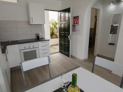 Una cocina o zona de cocina en Puerto Rico apartamento 1 dormitorio wifi piscina