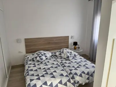 Cama o camas de una habitación en Bungalow Yumbo