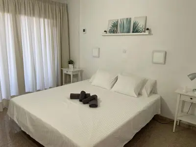 Cama o camas de una habitación en Las Camelias 215 By Pride Holiday Rentals