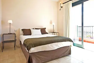 Cama o camas de una habitación en Salobre Morro Golf 6