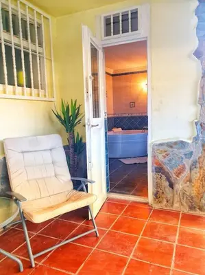 Zona de estar de The perfect place to relax Bedroom with hot tub, beautiful tropical garden area. Bbq and big open spaces through all the house.It is located in a quiet place, but still 5 min away from the touristic Puerto Rico and walking distance from the beach