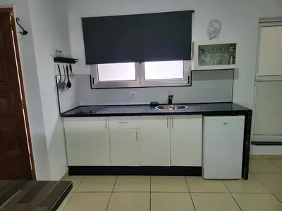 Una cocina o zona de cocina en La Naval 209, Atico - CIRTA