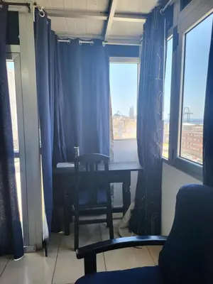 Zona de estar de La Naval 209, Atico - CIRTA