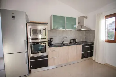 Una cocina o zona de cocina en Deluxe Las Vegas Golf - by Gestión Vacacional Canarias