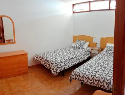 Cama o camas de una habitación en EL MORRO SEA VIEW APARTMENT