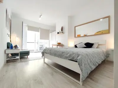 Cama o camas de una habitación en Las Canteras Suite