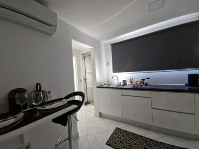 Una cocina o zona de cocina en Ocean Surf Suite