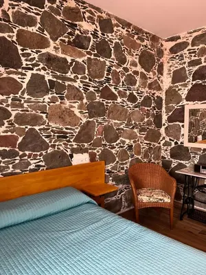 Cama o camas de una habitación en Casa rural con baño adaptado y piscina en Mogán