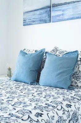 Cama o camas de una habitación en Home2Book Blue Sea View Patalavaca Beach Apartment