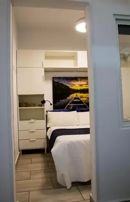 Cama o camas de una habitación en Vivienda Crispin