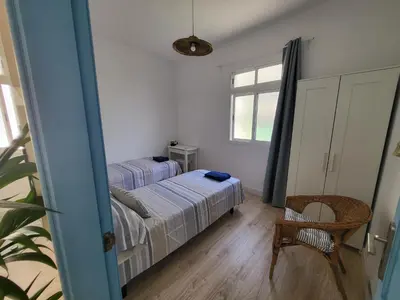 Cama o camas de una habitación en Apartamento calandria confital con terraza próxima playa