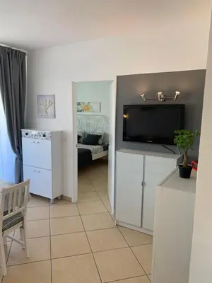 Una cocina o zona de cocina en Appartamento confortevole con piscina 7