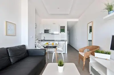 Una cocina o zona de cocina en Home2Book Cozy Apartment Beach Front Las Canteras